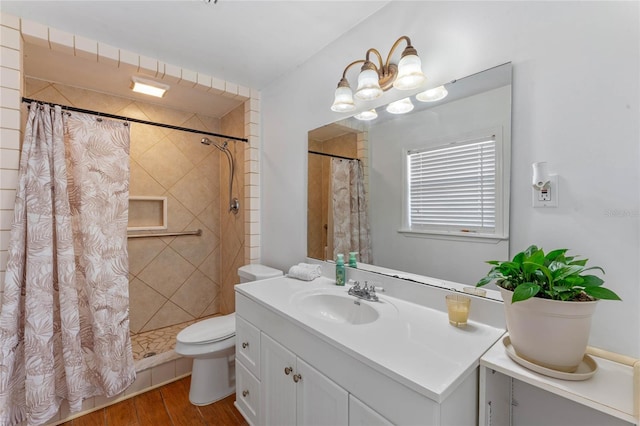 1021 Mare Bello Dr, Winter Park, FL 32792 - full bath with a tile shower, toilet, and wood finished floors