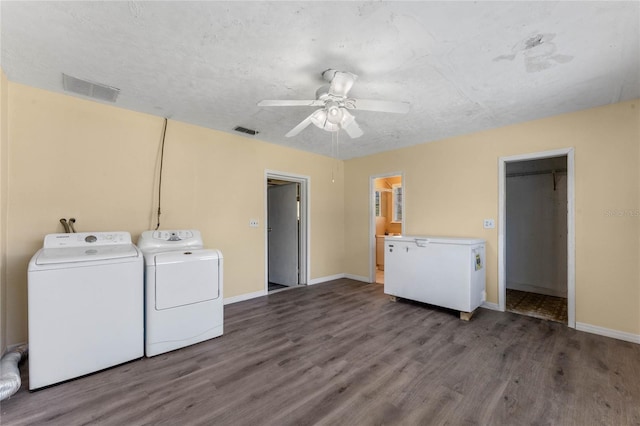 1021 Mare Bello Dr, Winter Park, FL 32792 - clothes washing area with washer and dryer, visible vents, and wood finished floors