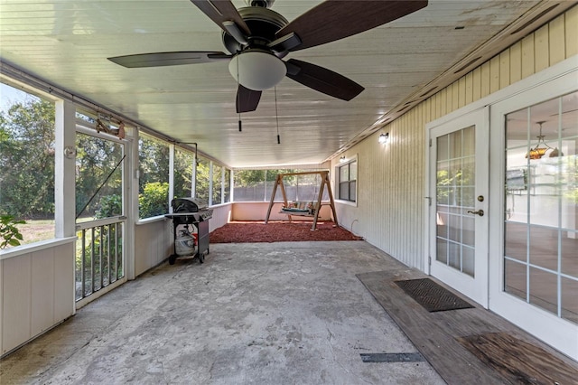 1021 Mare Bello Dr, Winter Park, FL 32792 - unfurnished sunroom with french doors and a ceiling fan