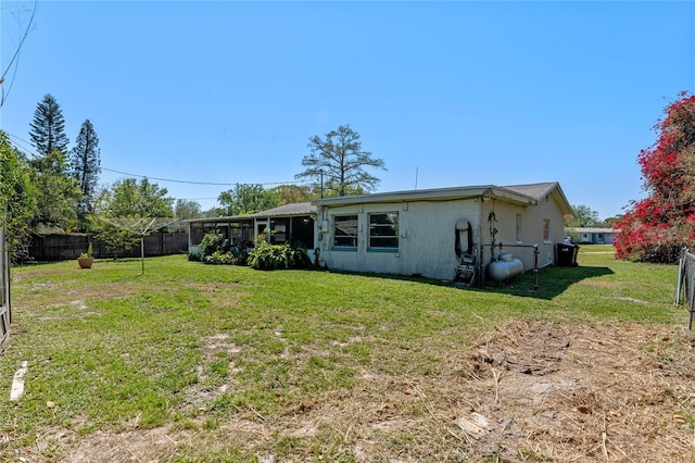1021 Mare Bello Dr, Winter Park, FL 32792 - back of property featuring a yard and fence