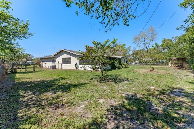 1021 Mare Bello Dr, Winter Park, FL 32792 - view of yard featuring a fenced backyard and cooling unit