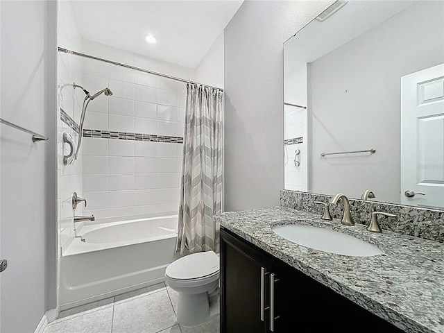 bathroom with tile patterned floors, visible vents, shower / bath combo with shower curtain, toilet, and vanity