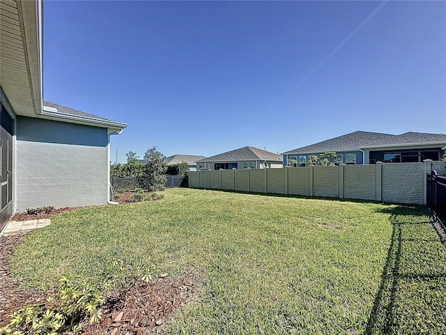 view of yard with fence