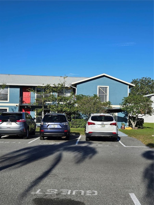 view of front of house featuring uncovered parking