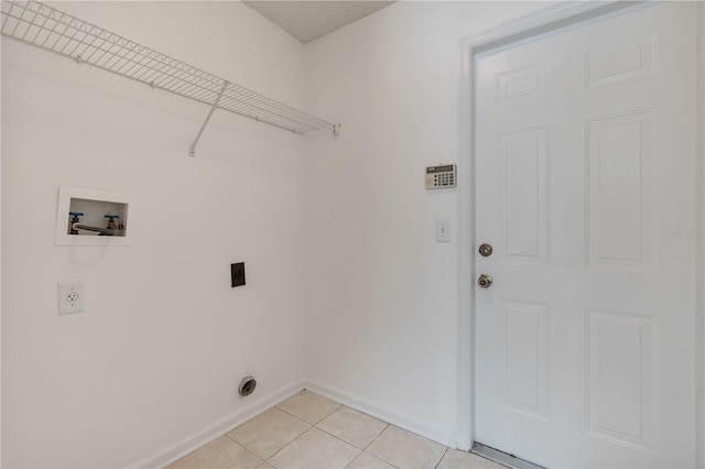 washroom with light tile patterned floors, baseboards, laundry area, electric dryer hookup, and washer hookup