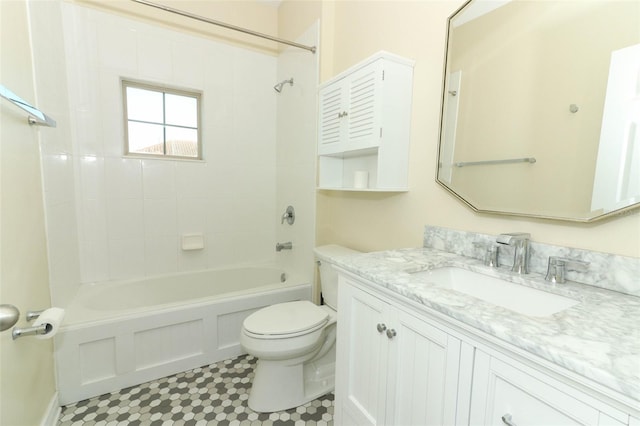 bathroom featuring vanity, toilet, and shower / bath combination