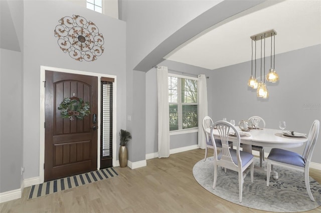 2351 Kelbrook Ct, Oviedo, FL 32765 - entryway featuring wood finished floors, baseboards, and arched walkways