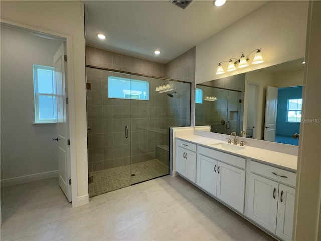 full bathroom featuring recessed lighting, visible vents, a stall shower, and vanity