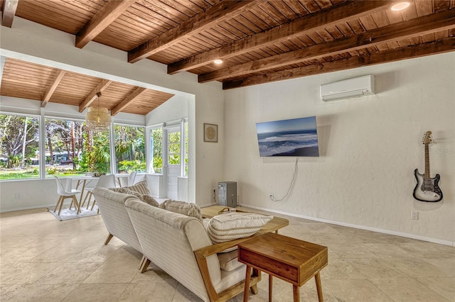 living area with wood ceiling, beamed ceiling, baseboards, and an AC wall unit