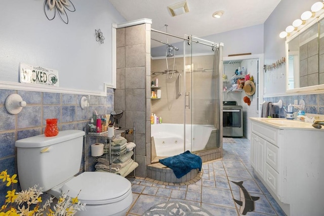 bathroom with tiled shower, toilet, tile walls, and a whirlpool tub