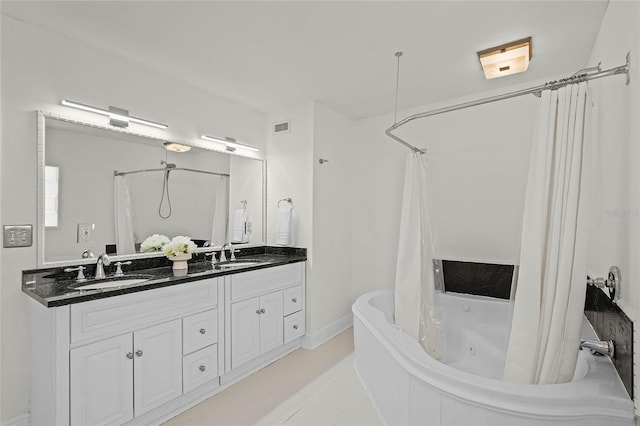 bathroom with a sink, visible vents, double vanity, and a combined bath / shower with jetted tub