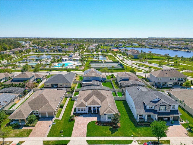 aerial view featuring a residential view and a water view