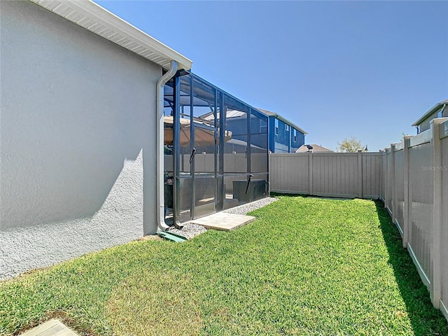 view of yard featuring a fenced backyard