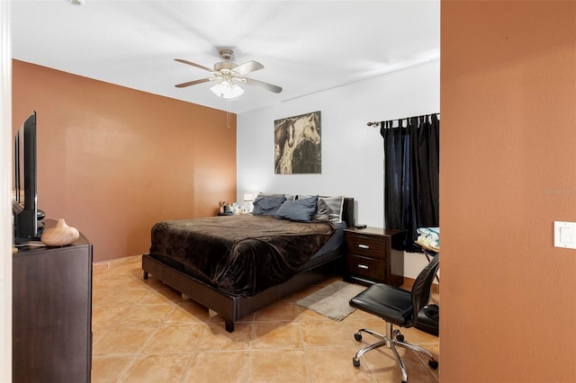 bedroom featuring light tile patterned flooring and a ceiling fan