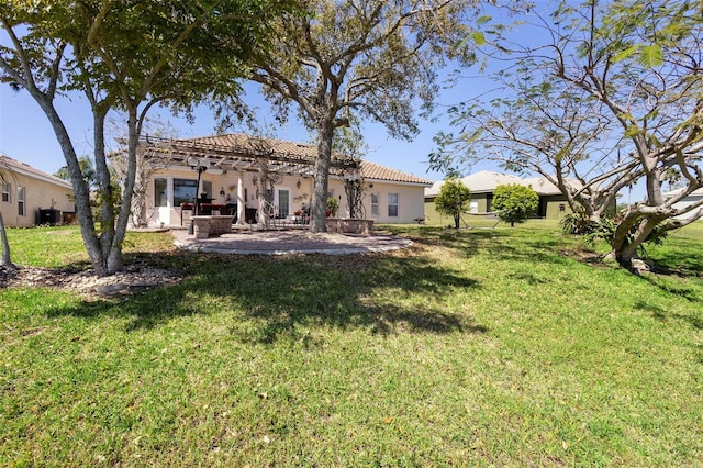 view of yard with cooling unit and a patio