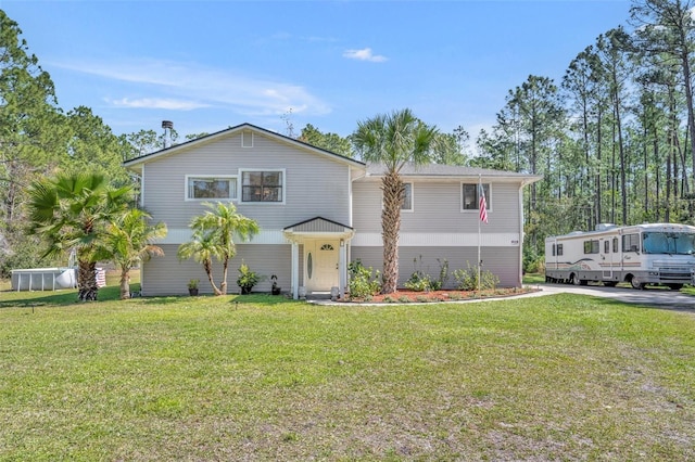 view of front of home featuring a front lawn