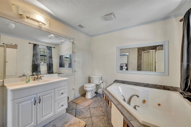 bathroom with a jetted tub, toilet, visible vents, and a textured ceiling