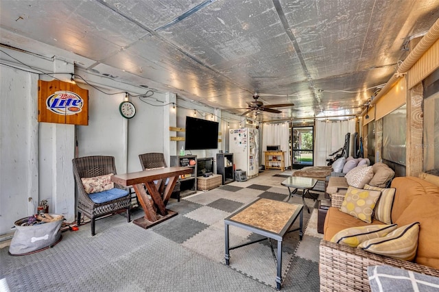 interior space featuring a ceiling fan