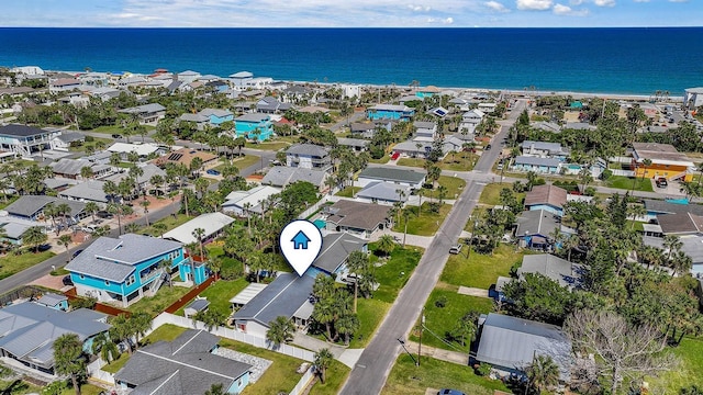 aerial view with a water view and a residential view