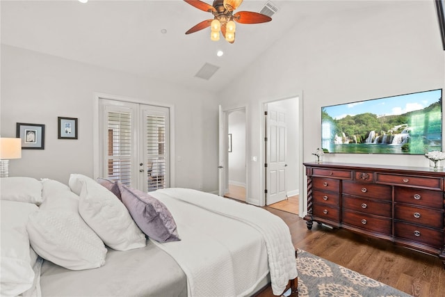 bedroom featuring a ceiling fan, baseboards, high vaulted ceiling, dark wood-type flooring, and french doors