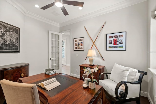 home office featuring baseboards, wood finished floors, ceiling fan, and ornamental molding