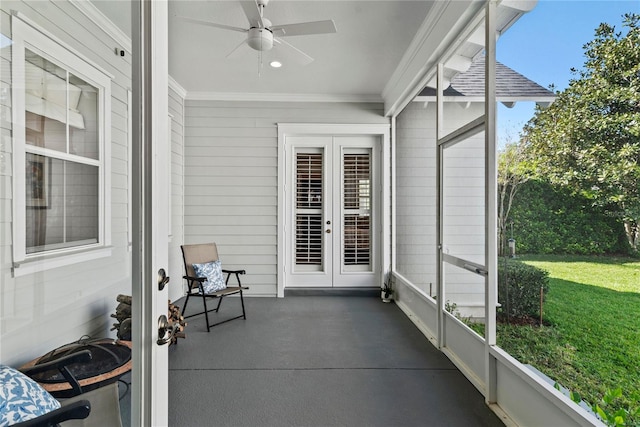 sunroom / solarium with french doors and ceiling fan