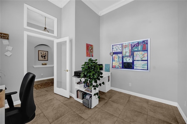 office space featuring french doors, baseboards, and crown molding