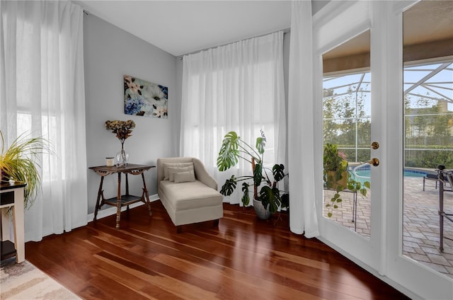 sitting room featuring wood finished floors