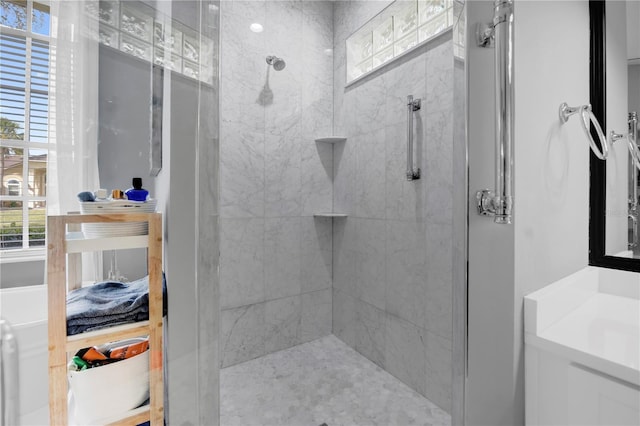 bathroom featuring a tile shower