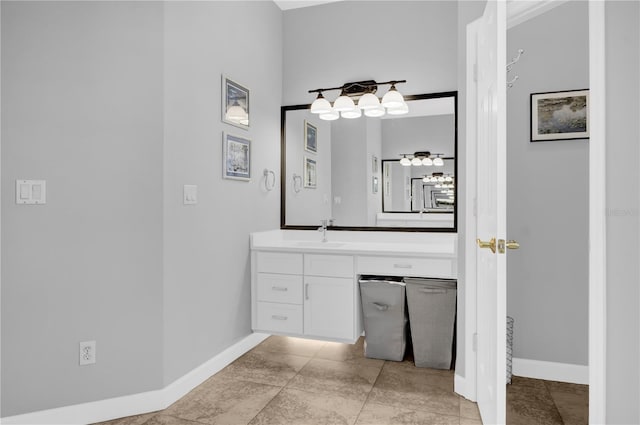 bathroom featuring vanity and baseboards