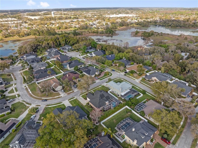 aerial view featuring a residential view and a water view