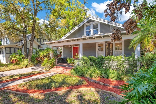 view of front of house with a porch and driveway