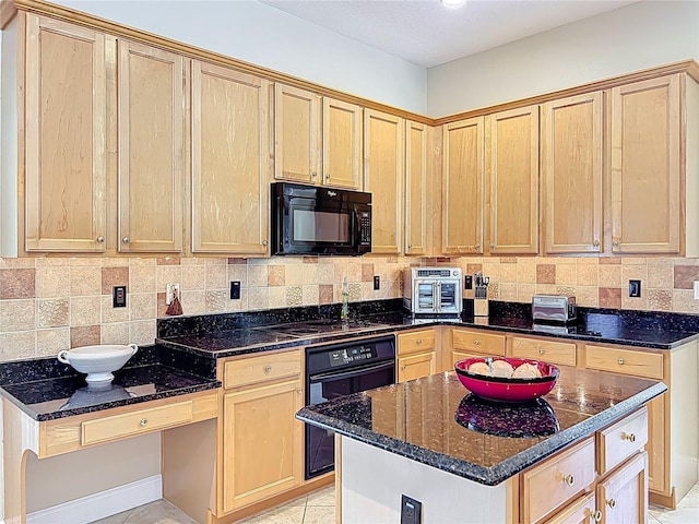 kitchen featuring decorative backsplash, black appliances, light brown cabinets, and dark stone counters