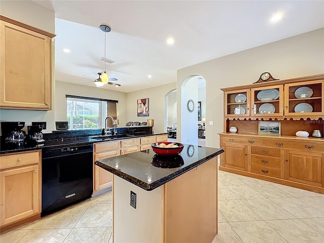 kitchen featuring visible vents, a ceiling fan, a sink, black dishwasher, and arched walkways