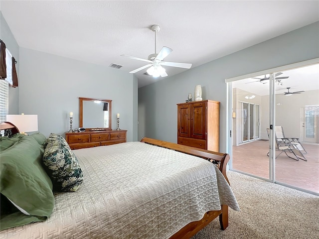 bedroom with visible vents, ceiling fan, access to exterior, vaulted ceiling, and light colored carpet