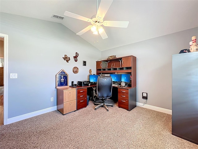 office space with baseboards, visible vents, lofted ceiling, ceiling fan, and light carpet