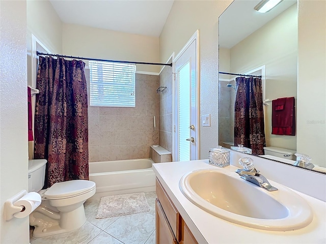 full bathroom with tile patterned flooring, toilet, vanity, and shower / tub combo