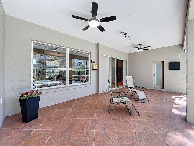 view of patio / terrace with a ceiling fan