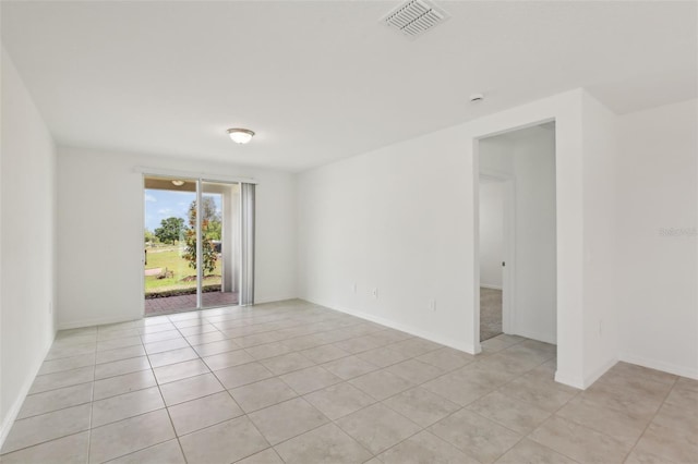 800 Griffon Ave, Lake Alfred, FL 33850 - spare room with light tile patterned floors and baseboards