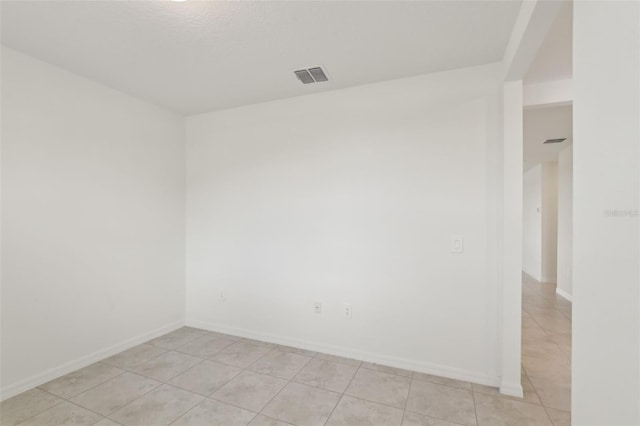 800 Griffon Ave, Lake Alfred, FL 33850 - spare room featuring light tile patterned floors and baseboards