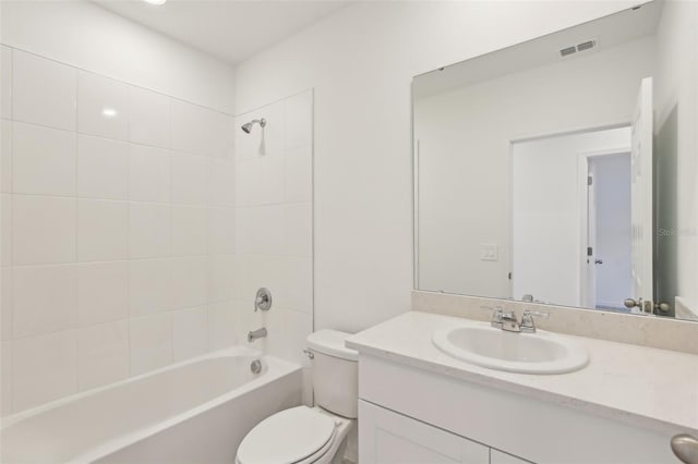 800 Griffon Ave, Lake Alfred, FL 33850 - bathroom featuring vanity, toilet, and shower / washtub combination