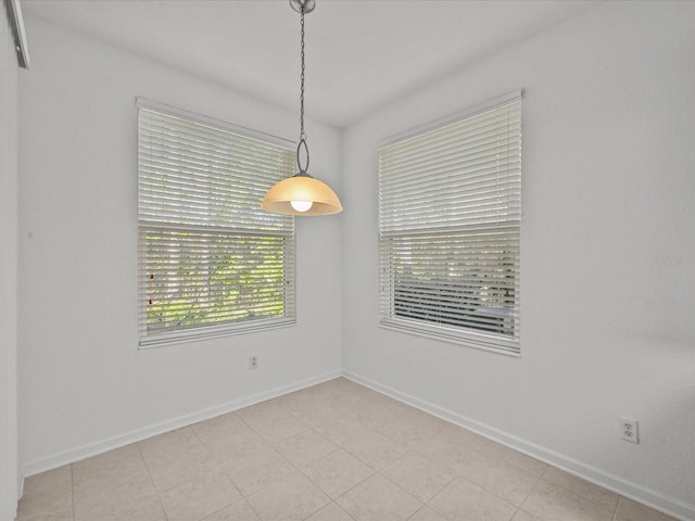 empty room with baseboards