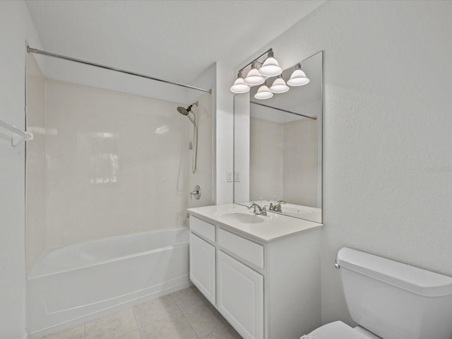 bathroom with tile patterned floors, toilet, vanity, and bathtub / shower combination