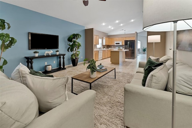 living area featuring lofted ceiling, recessed lighting, light tile patterned flooring, baseboards, and ceiling fan