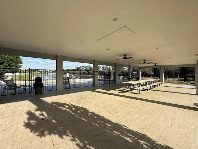 view of patio featuring fence