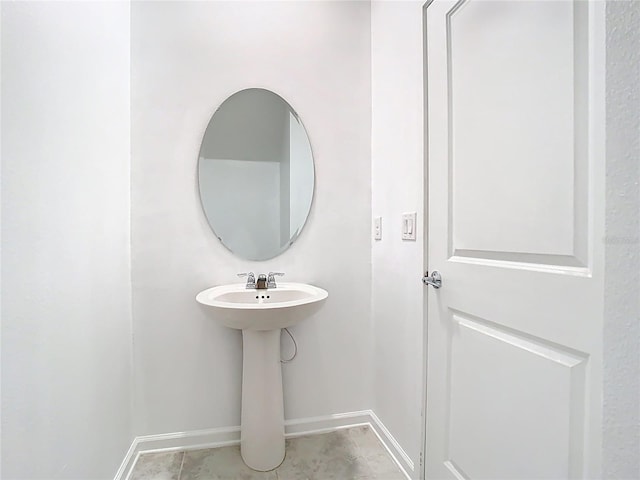 bathroom featuring baseboards