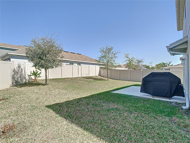 view of yard featuring a fenced backyard