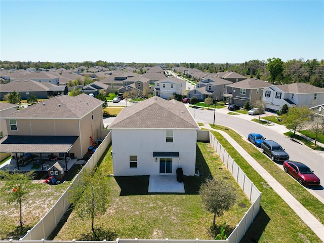 drone / aerial view with a residential view