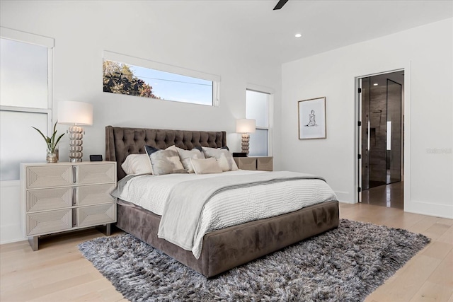 bedroom with light wood-style flooring, recessed lighting, baseboards, and ceiling fan