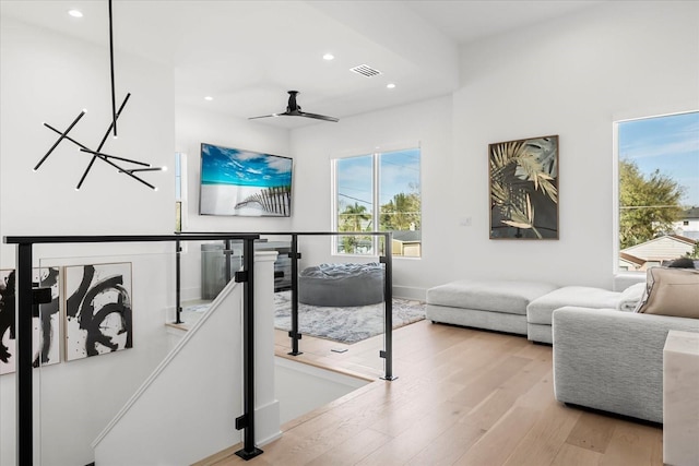 office area featuring a ceiling fan, recessed lighting, wood finished floors, and visible vents